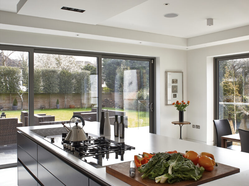 Kitchen island with fresh vegetables on it