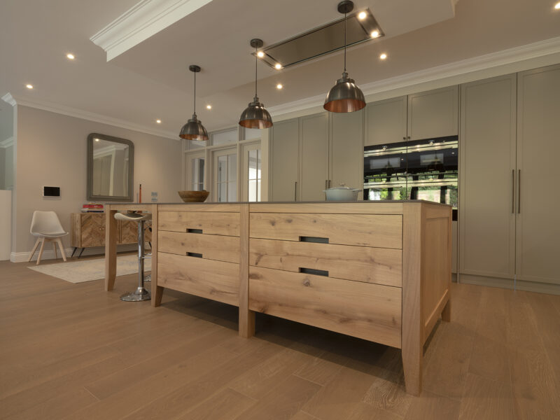floor to ceiling cabinets with timber island