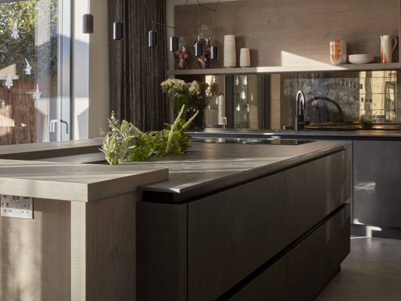 island table with plants in it in a modern kitchen