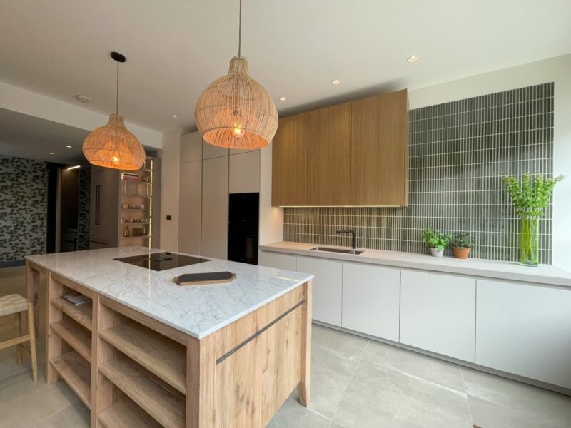Modern kitchen with wooden island and marble countertop