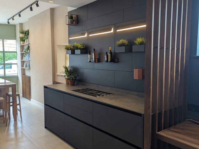 stylish kitchen design with dark cabinetry