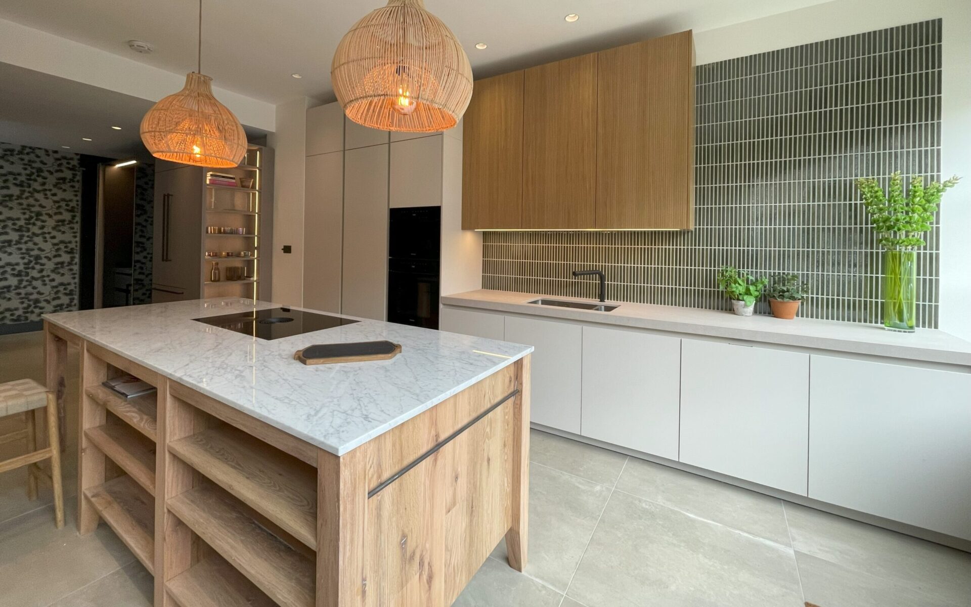 Modern kitchen with wooden island and marble countertop